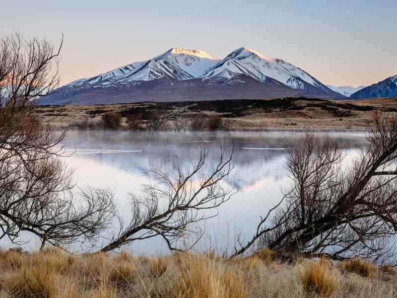 Lake Clearwater with a view of snow-covered Mount Potts (2184m), Canterbury, New Zealand